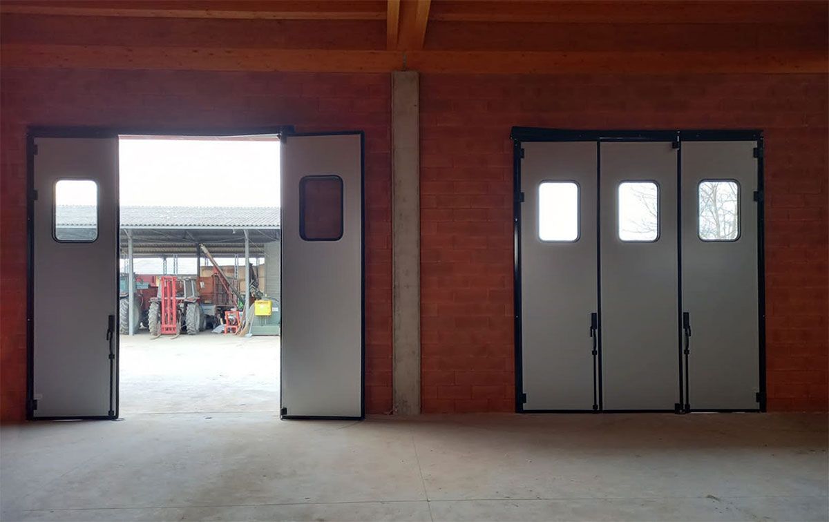 Porte pliante industrielle - Panneaux rigides anti-cambriolage - Hermétique et sécurisée_4