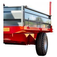 Solution de transport agricole avec remorque à ridelles rabattables