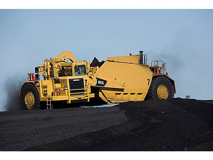 657g - décapeuses à benne ouverte - caterpillar finance france - 33.6 m³_4