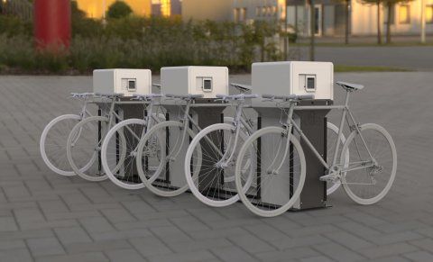Range vélo en aluminium et plastique avec 4 prises pour la recharge