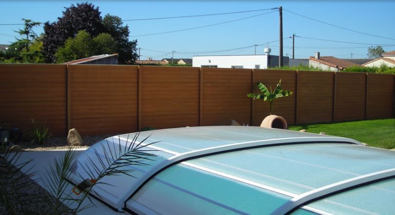 Clôture béton personnalisable avec design effet bois