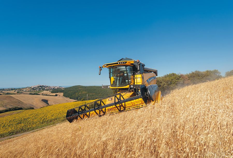 Cx6.90 laterale moissonneuse batteuse - new holland -trémie capacité / version hillside (l) 9 300_4