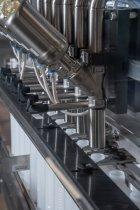 Remplisseuse linéaire  automatique premium Stoppil - jusqu'à 5000 bouteilles/heure - structure en Inox 304L_4