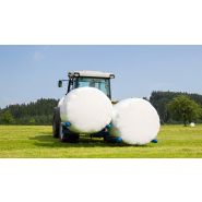 Équipement agricole pour transport de balles rondes enrubannées