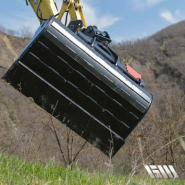 Godet de curage pour nivellement des berges et canaux