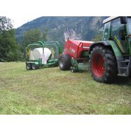 Ciseaux intégrés pour couper et attacher le film sur l'enrubanneuse Agronic