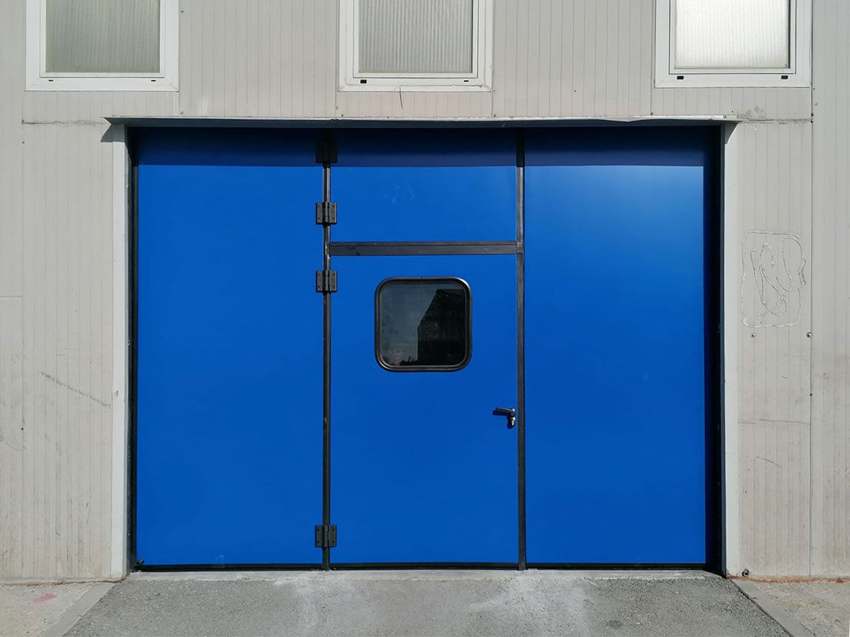 Porte pliante industrielle - Panneaux rigides anti-cambriolage - Hermétique et sécurisée_5