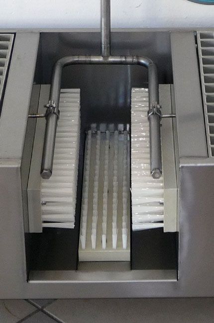 Nettoyeur de bottes avec système d'évacuation des eaux usées