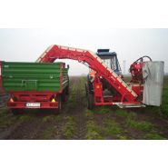 Machine pour récolte de carottes avec grand soin des légumes