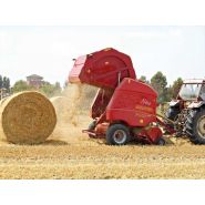 Presse à balles rondes équipée de 28 dents et 4 tubes porte-ressort