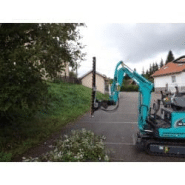 Taille-haie pour pelle avec système hydraulique auxiliaire