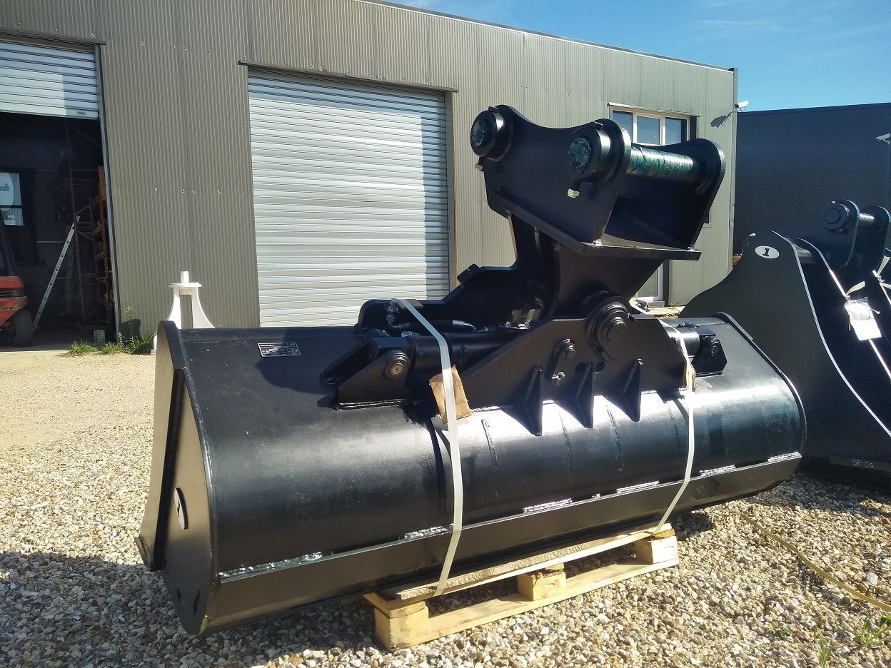 Godet orientable robuste pour engins de chantier