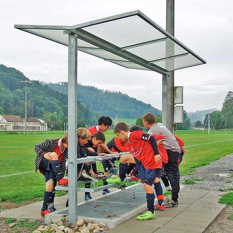 Machine de nettoyage de chaussures avec évacuation d'eau intégrée