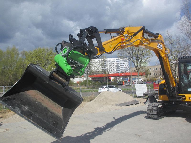 Tiltrotator sans vérins pour travaux publics et terrassement