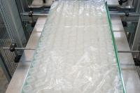 Ensacheuse semi-automatique pour flacons thermoplastiques jusqu'à 1200 mm de largeur et 1400 m de long_6