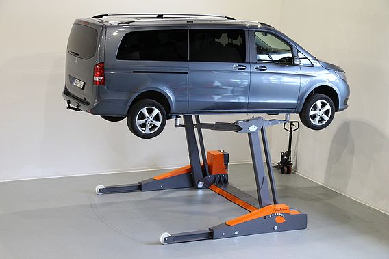 Pont élévateur électro-hydraulique avec chargeur intégré