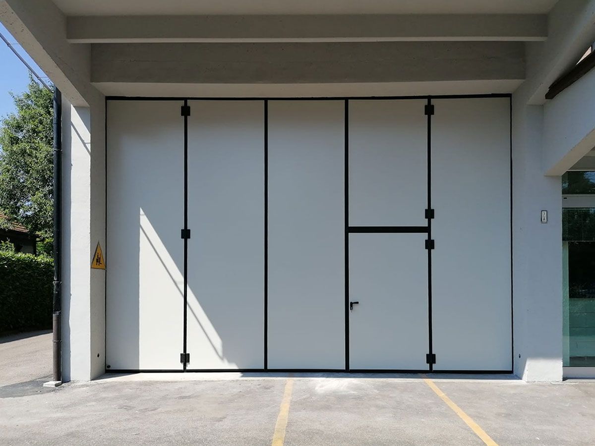 Porte pliante industrielle - Panneaux rigides anti-cambriolage - Hermétique et sécurisée_7